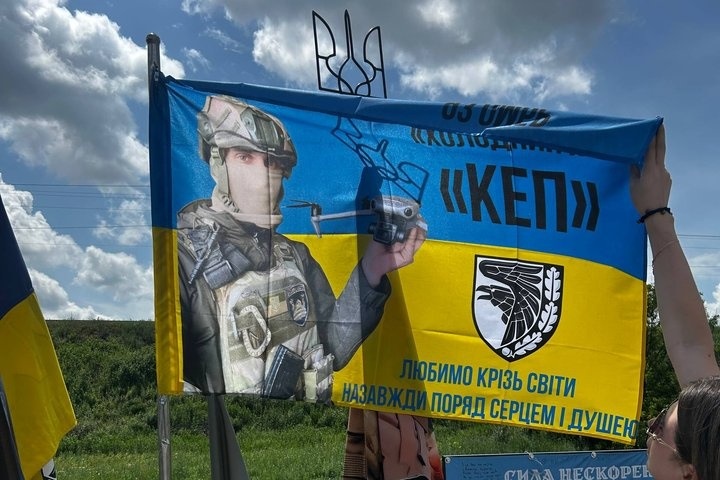 Прапор з портретом Владислава Сібарова